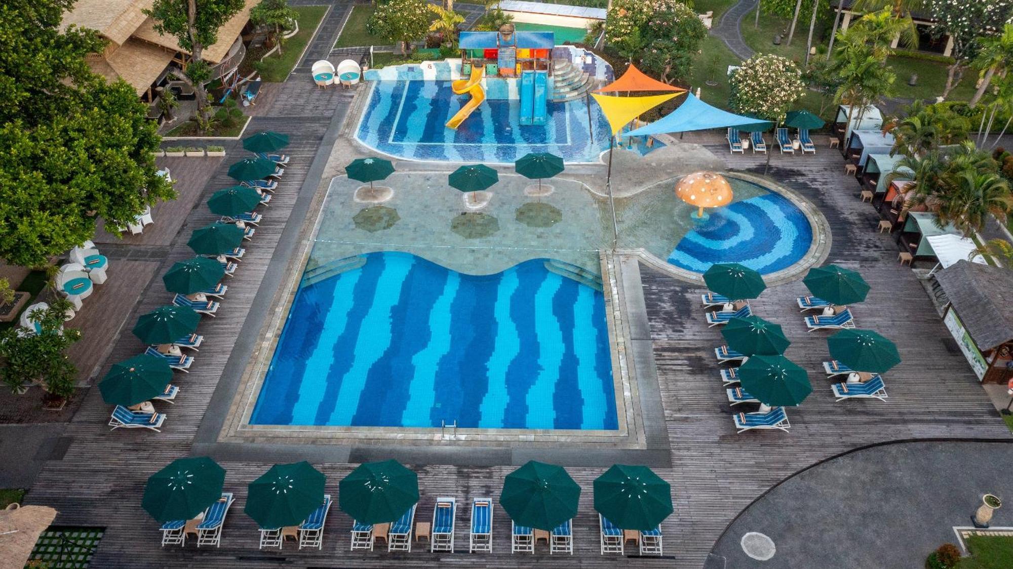 Prama Sanur Beach Bali Exterior foto The swimming pool at the Royal Garden Resort